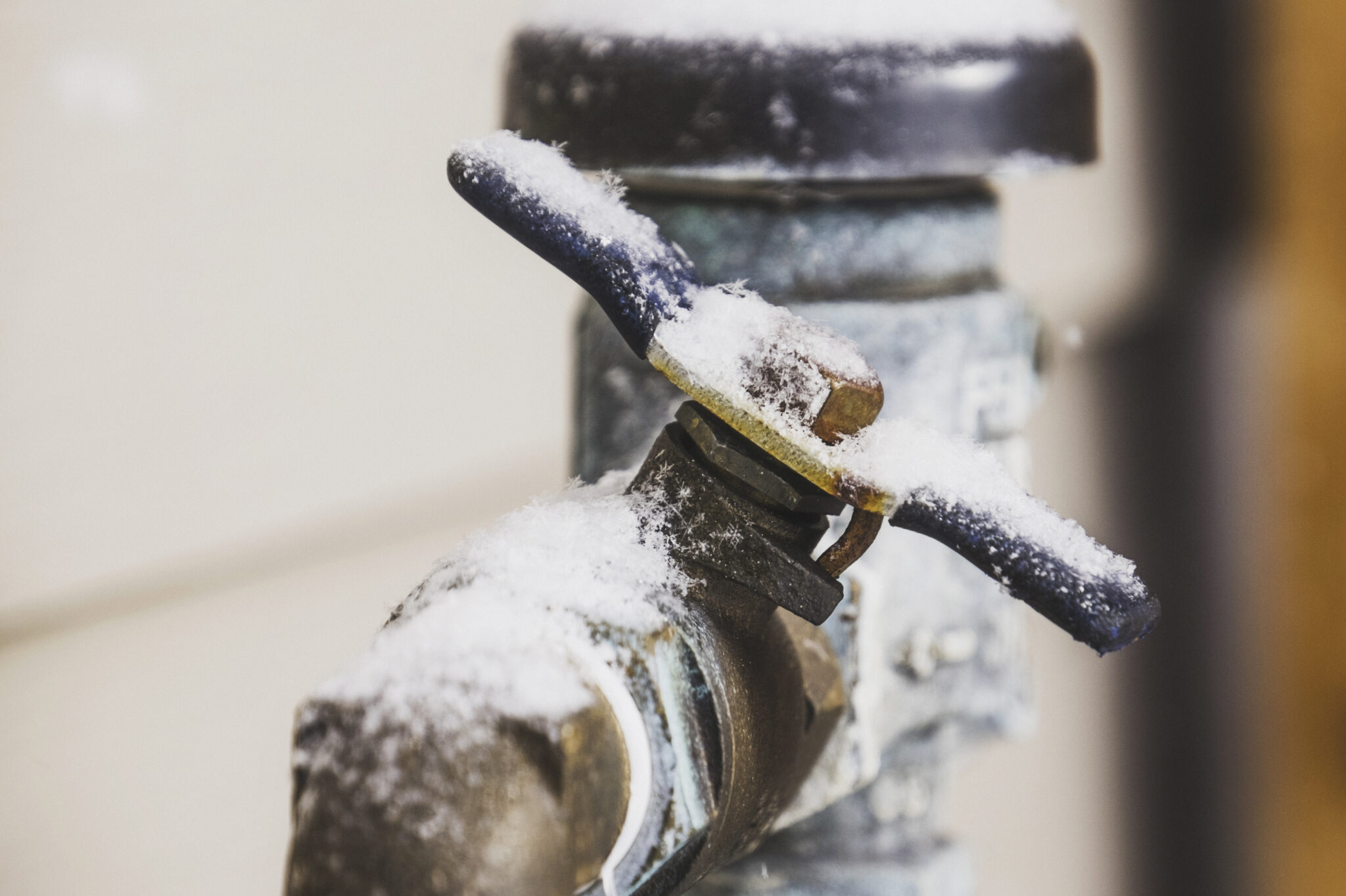 Frozen water shut off handle in snowstorm Frozen water shut off handle in snowstorm